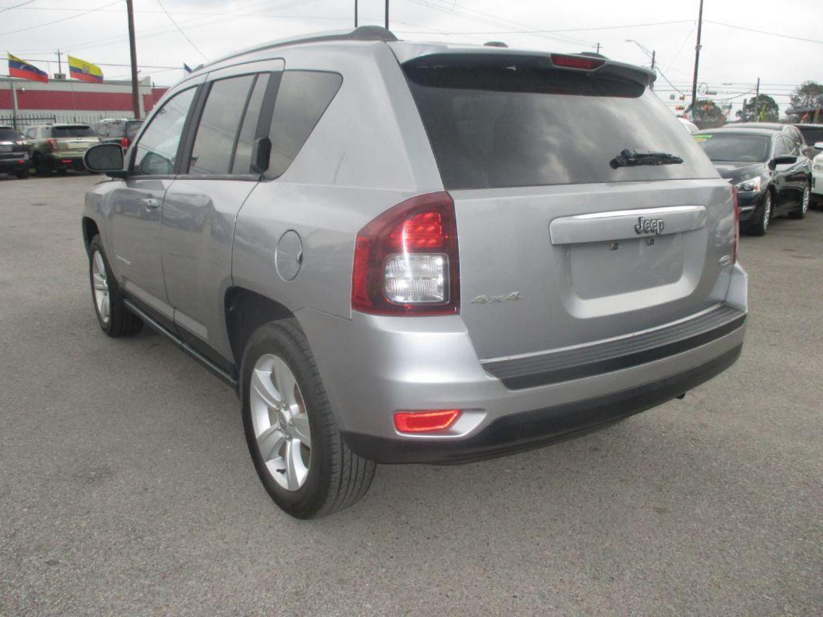 2016 SILVER JEEP COMPASS LATITUDE (1C4NJDEB3GD) with an 2.4L engine, Continuously Variable transmission, located at 830 E. Canino Rd., Houston, TX, 77037, (281) 405-0440, 38.358219, -81.729942 - Photo #2