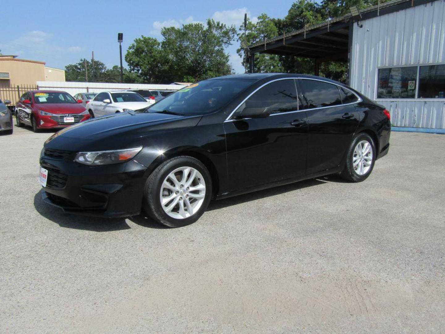 2017 BLACK CHEVROLET MALIBU LS (1G1ZB5ST5HF) with an 1.5L engine, Automatic transmission, located at 830 E. Canino Rd., Houston, TX, 77037, (281) 405-0440, 38.358219, -81.729942 - Photo#1