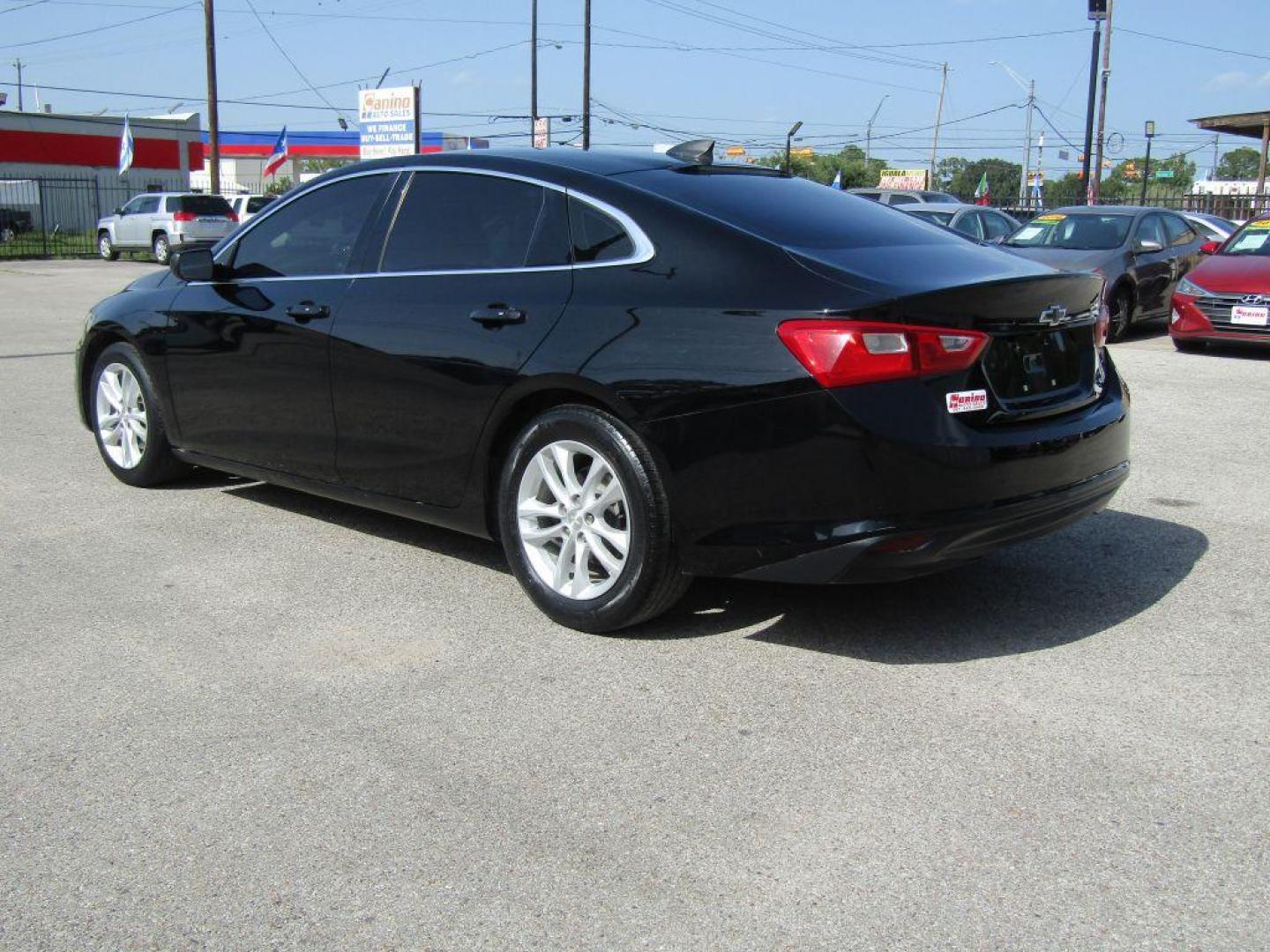 2017 BLACK CHEVROLET MALIBU LS (1G1ZB5ST5HF) with an 1.5L engine, Automatic transmission, located at 830 E. Canino Rd., Houston, TX, 77037, (281) 405-0440, 38.358219, -81.729942 - Photo#2