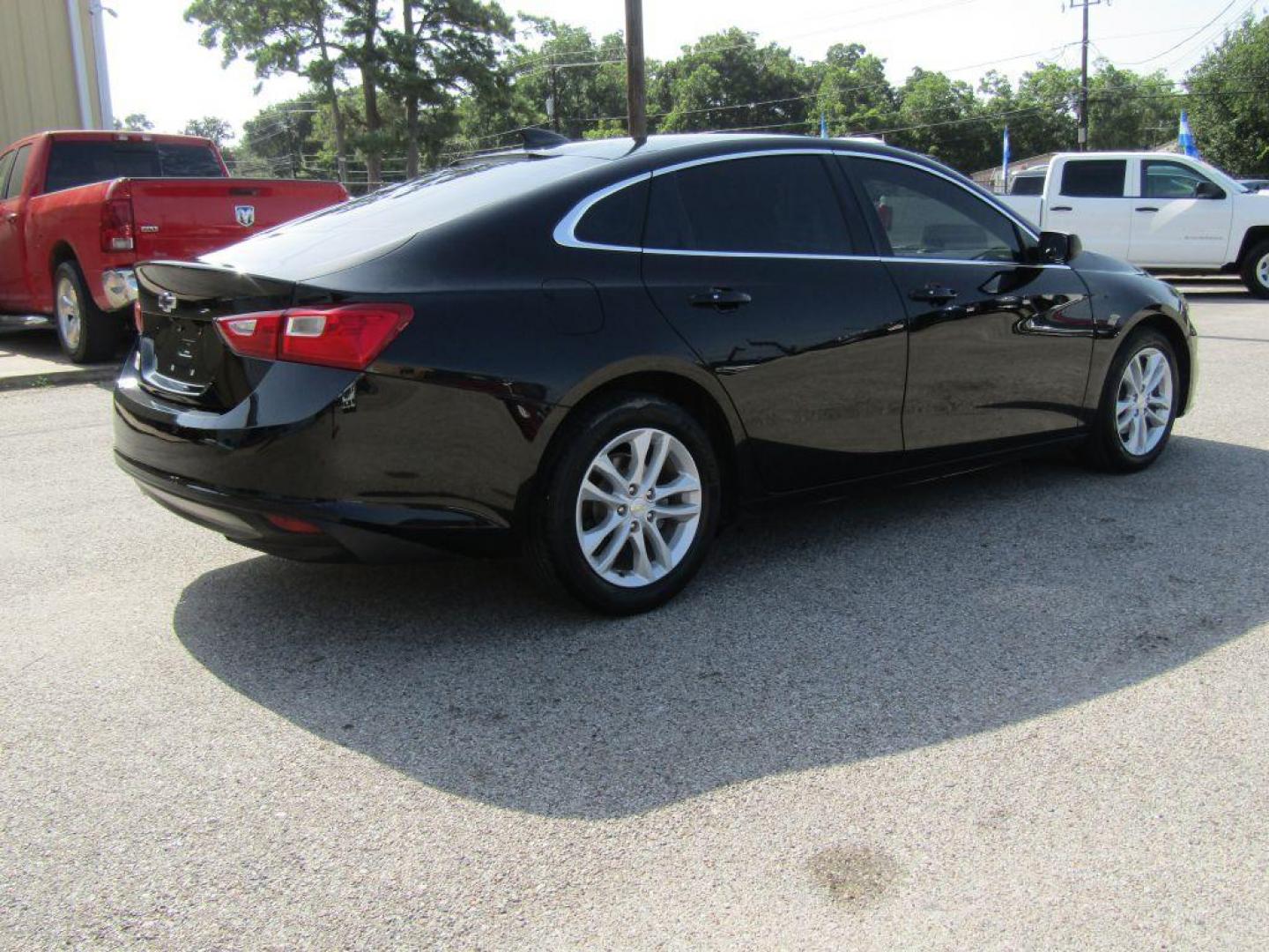 2017 BLACK CHEVROLET MALIBU LS (1G1ZB5ST5HF) with an 1.5L engine, Automatic transmission, located at 830 E. Canino Rd., Houston, TX, 77037, (281) 405-0440, 38.358219, -81.729942 - Photo#4