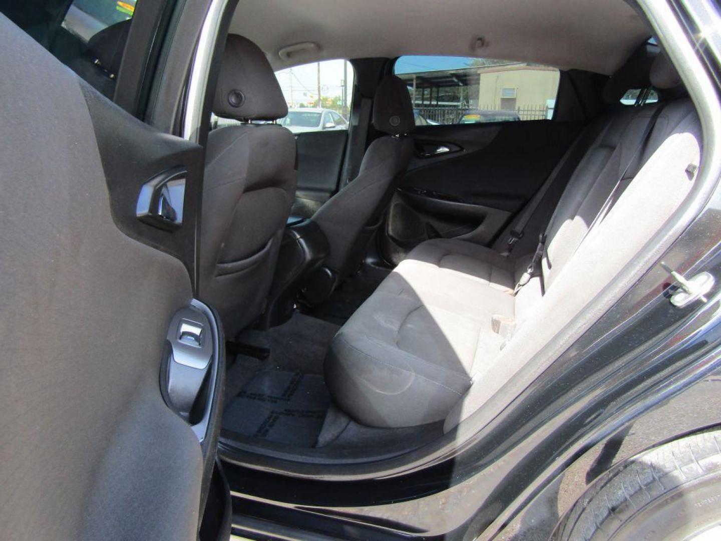 2017 BLACK CHEVROLET MALIBU LS (1G1ZB5ST5HF) with an 1.5L engine, Automatic transmission, located at 830 E. Canino Rd., Houston, TX, 77037, (281) 405-0440, 38.358219, -81.729942 - Photo#7