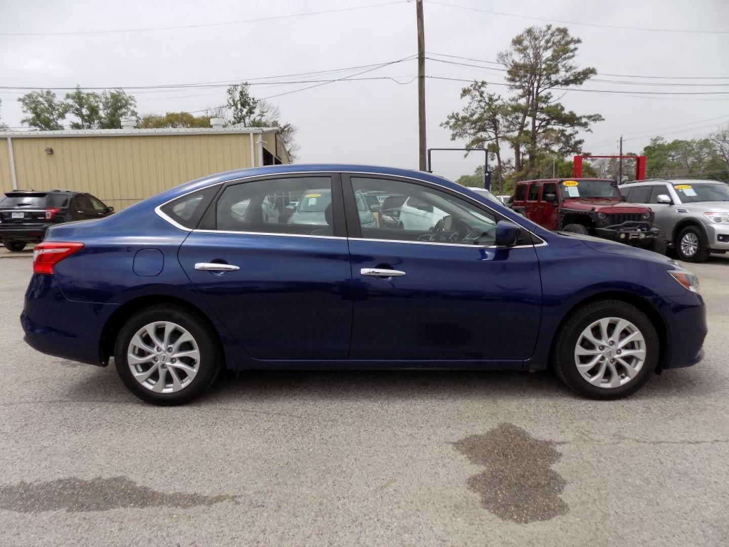 2019 BLUE NISSAN SENTRA S (3N1AB7AP4KL) with an 1.8L engine, Continuously Variable transmission, located at 830 E. Canino Rd., Houston, TX, 77037, (281) 405-0440, 38.358219, -81.729942 - Photo#2