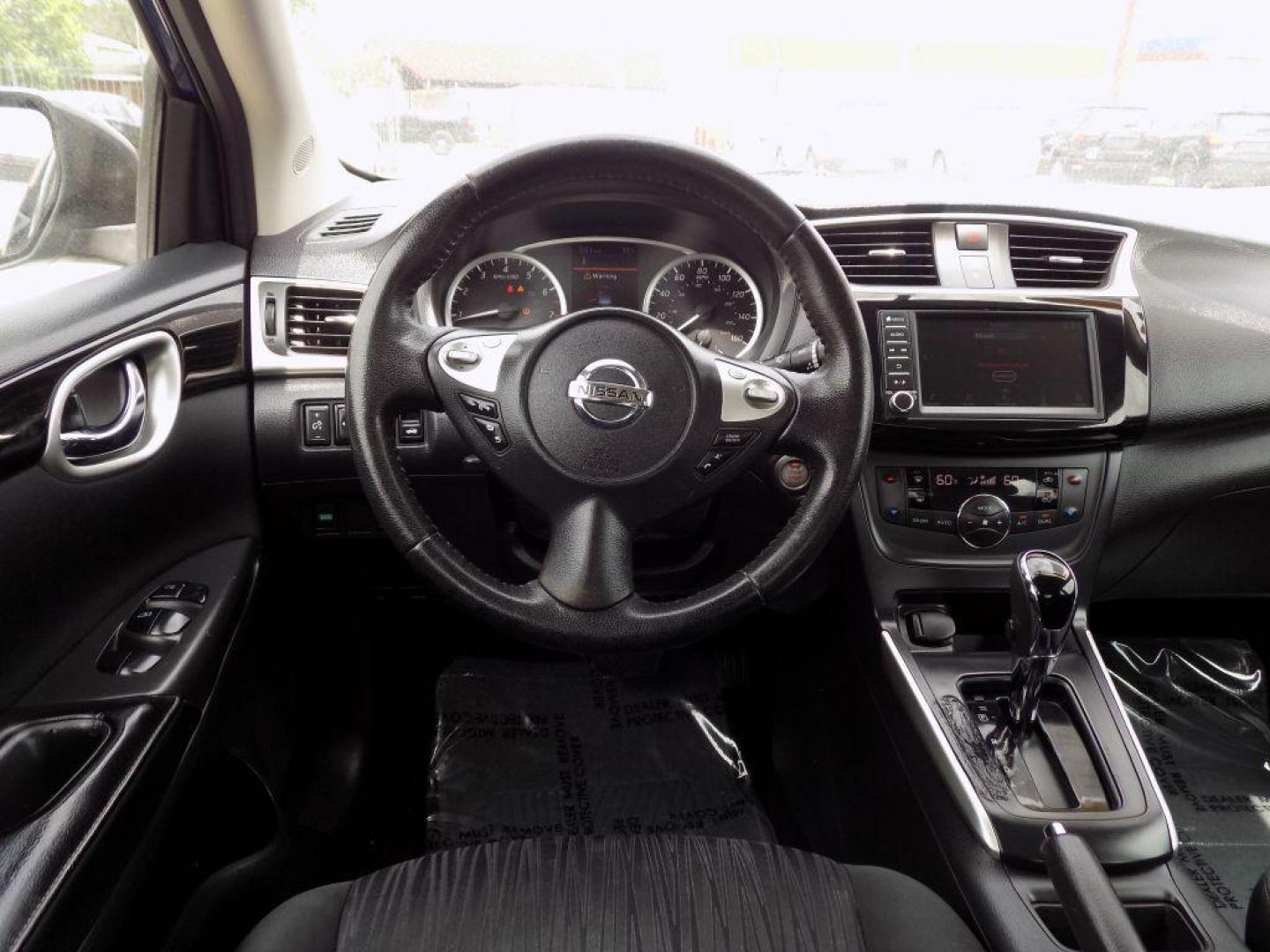 2019 BLUE NISSAN SENTRA S (3N1AB7AP4KL) with an 1.8L engine, Continuously Variable transmission, located at 830 E. Canino Rd., Houston, TX, 77037, (281) 405-0440, 38.358219, -81.729942 - Photo#13