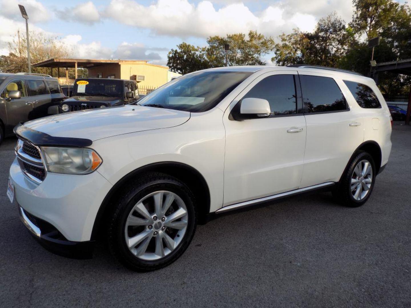 2012 WHITE DODGE DURANGO CREW (1C4SDHDT6CC) with an 5.7L engine, Automatic transmission, located at 830 E. Canino Rd., Houston, TX, 77037, (281) 405-0440, 38.358219, -81.729942 - Photo#5