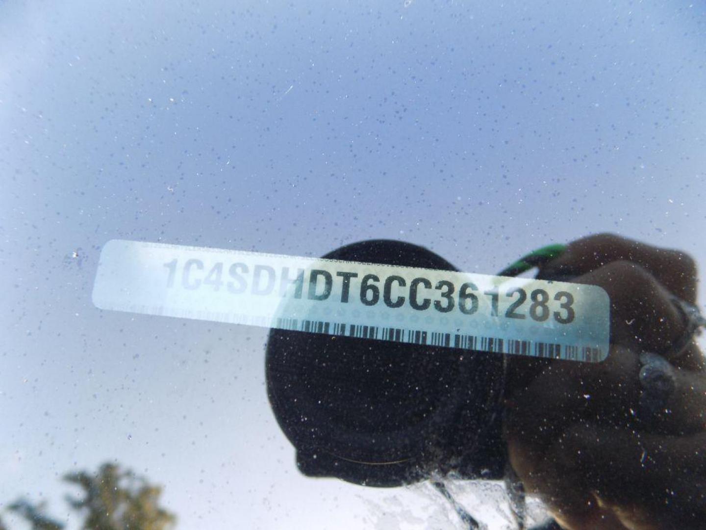 2012 WHITE DODGE DURANGO CREW (1C4SDHDT6CC) with an 5.7L engine, Automatic transmission, located at 830 E. Canino Rd., Houston, TX, 77037, (281) 405-0440, 38.358219, -81.729942 - Photo#6