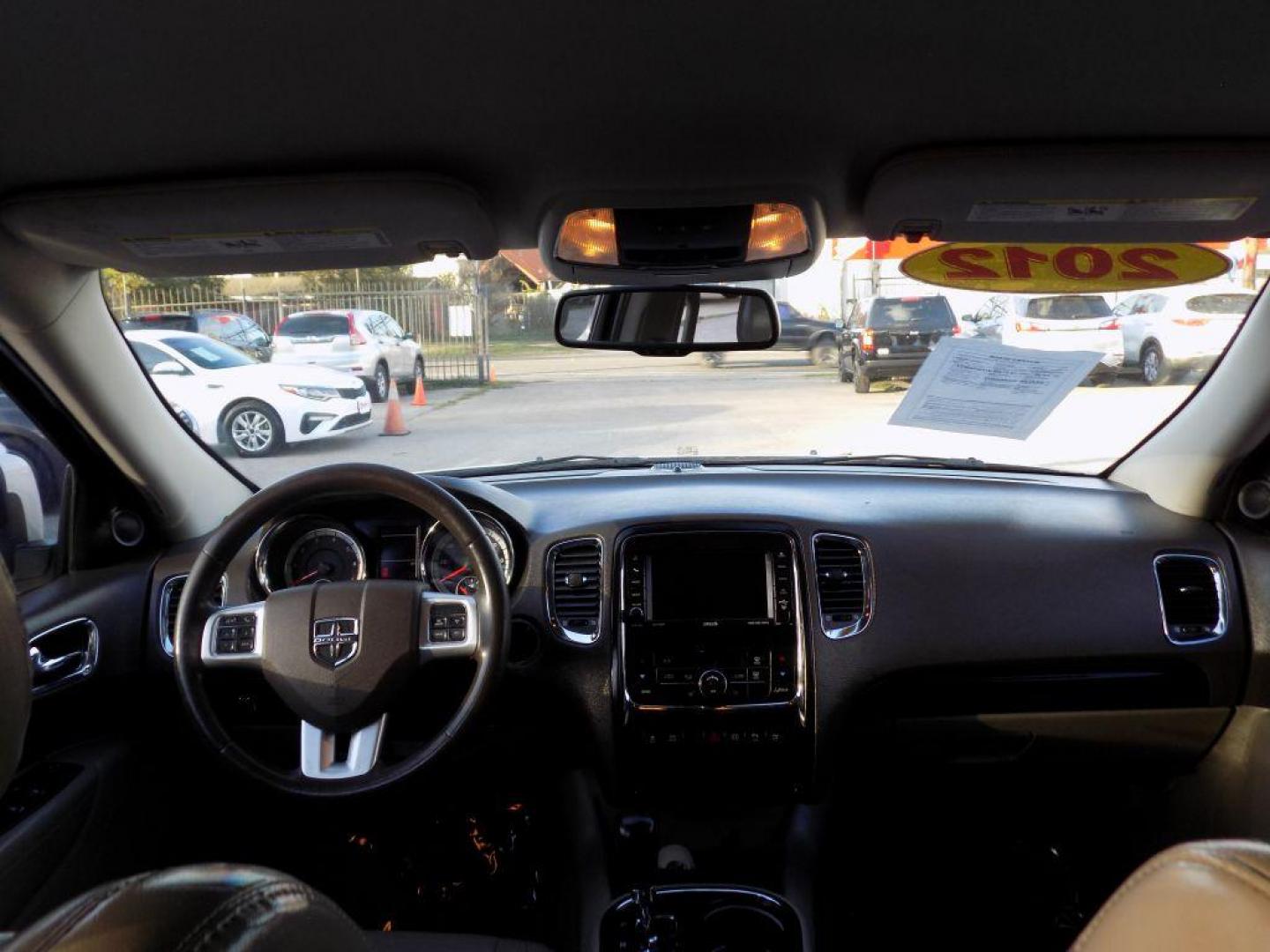 2012 WHITE DODGE DURANGO CREW (1C4SDHDT6CC) with an 5.7L engine, Automatic transmission, located at 830 E. Canino Rd., Houston, TX, 77037, (281) 405-0440, 38.358219, -81.729942 - Photo#8