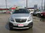 2016 SILVER BUICK ENCORE BASE (KL4CJASB7GB) with an 1.4L engine, Automatic transmission, located at 830 E. Canino Rd., Houston, TX, 77037, (281) 405-0440, 38.358219, -81.729942 - Photo#0