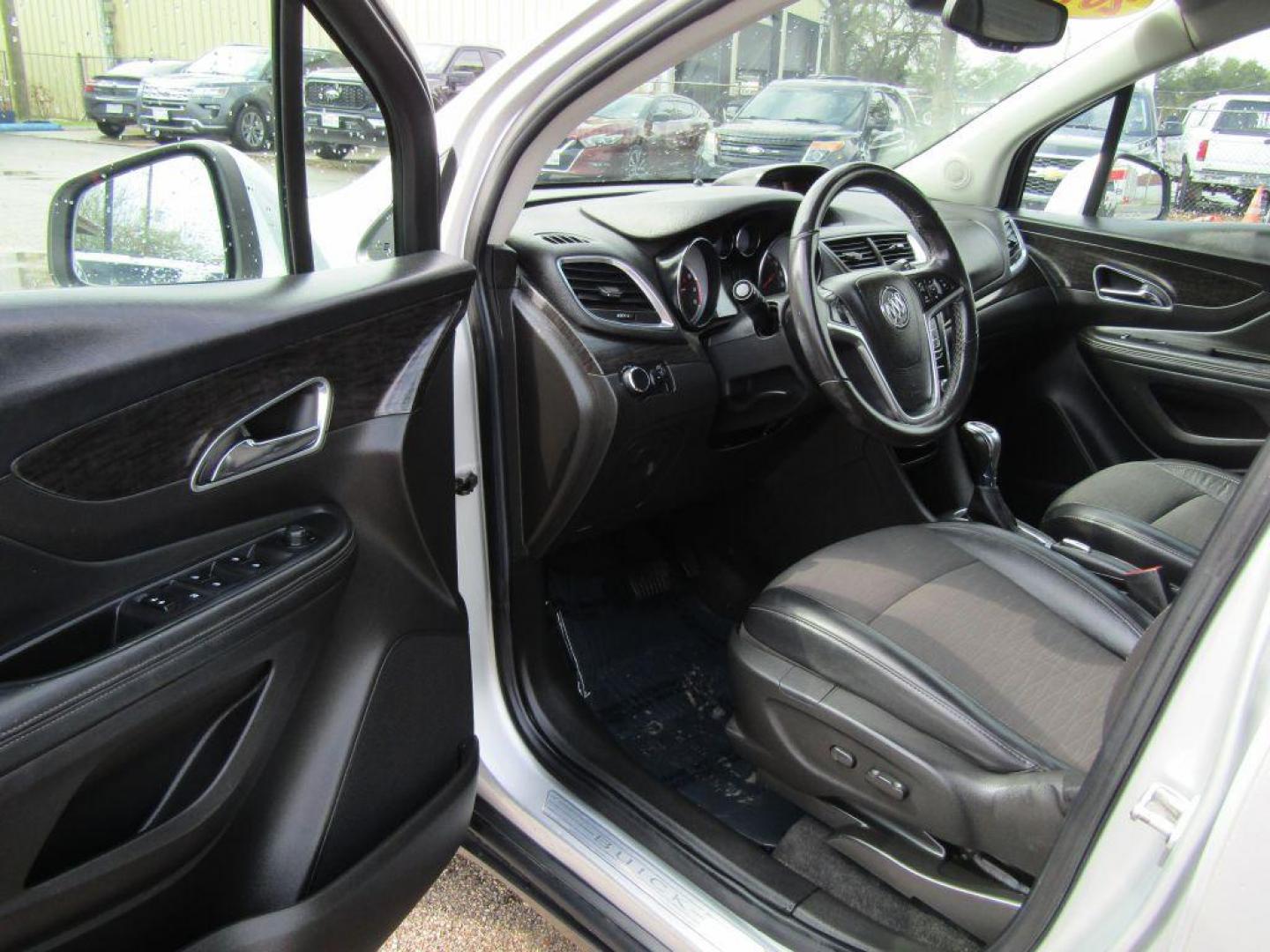 2016 SILVER BUICK ENCORE BASE (KL4CJASB7GB) with an 1.4L engine, Automatic transmission, located at 830 E. Canino Rd., Houston, TX, 77037, (281) 405-0440, 38.358219, -81.729942 - Photo#12