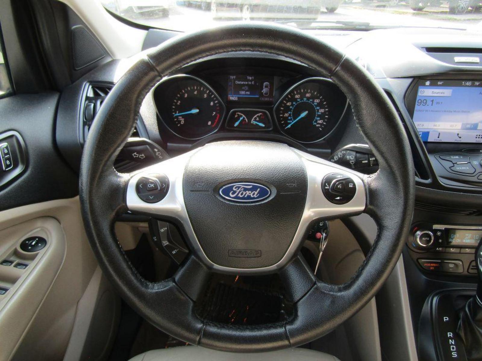 2016 WHITE FORD ESCAPE SE (1FMCU0GX0GU) with an 1.6L engine, Automatic transmission, located at 830 E. Canino Rd., Houston, TX, 77037, (281) 405-0440, 38.358219, -81.729942 - Photo #17