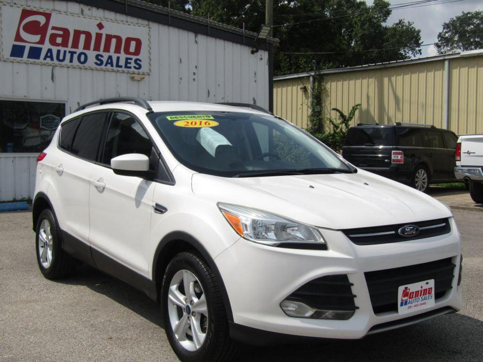 2016 WHITE FORD ESCAPE SE (1FMCU0GX0GU) with an 1.6L engine, Automatic transmission, located at 830 E. Canino Rd., Houston, TX, 77037, (281) 405-0440, 38.358219, -81.729942 - Photo #7
