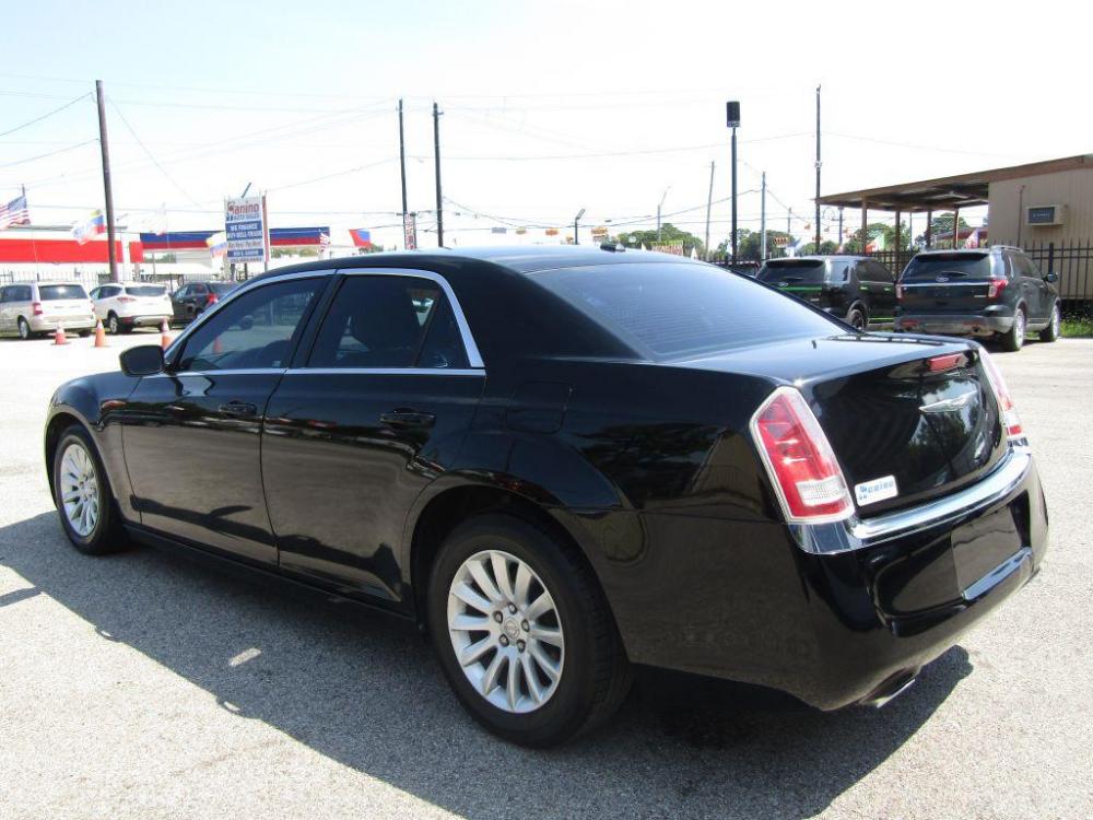 2013 BLACK CHRYSLER 300 (2C3CCAAG9DH) with an 3.6L engine, Automatic transmission, located at 830 E. Canino Rd., Houston, TX, 77037, (281) 405-0440, 38.358219, -81.729942 - Photo #3