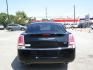 2013 BLACK CHRYSLER 300 (2C3CCAAG9DH) with an 3.6L engine, Automatic transmission, located at 830 E. Canino Rd., Houston, TX, 77037, (281) 405-0440, 38.358219, -81.729942 - Photo #4