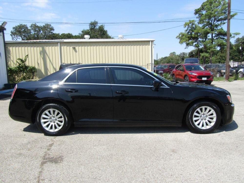 2013 BLACK CHRYSLER 300 (2C3CCAAG9DH) with an 3.6L engine, Automatic transmission, located at 830 E. Canino Rd., Houston, TX, 77037, (281) 405-0440, 38.358219, -81.729942 - Photo #6