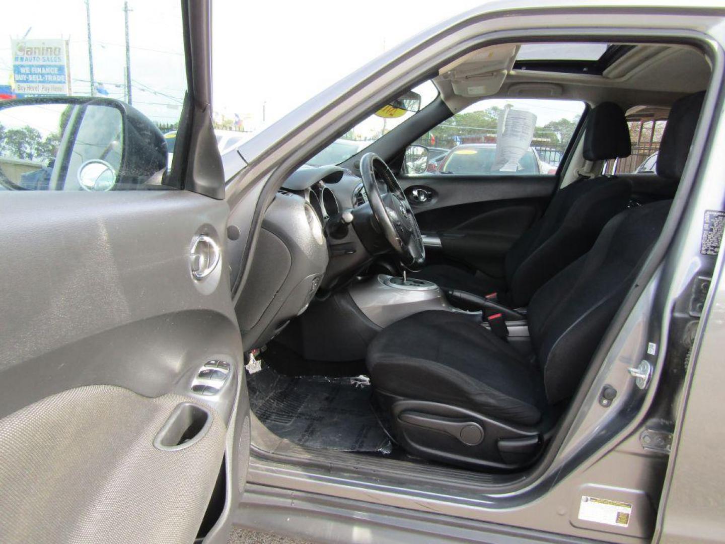 2015 GRAY NISSAN JUKE S (JN8AF5MR6FT) with an 1.6L engine, Continuously Variable transmission, located at 830 E. Canino Rd., Houston, TX, 77037, (281) 405-0440, 38.358219, -81.729942 - Photo#15