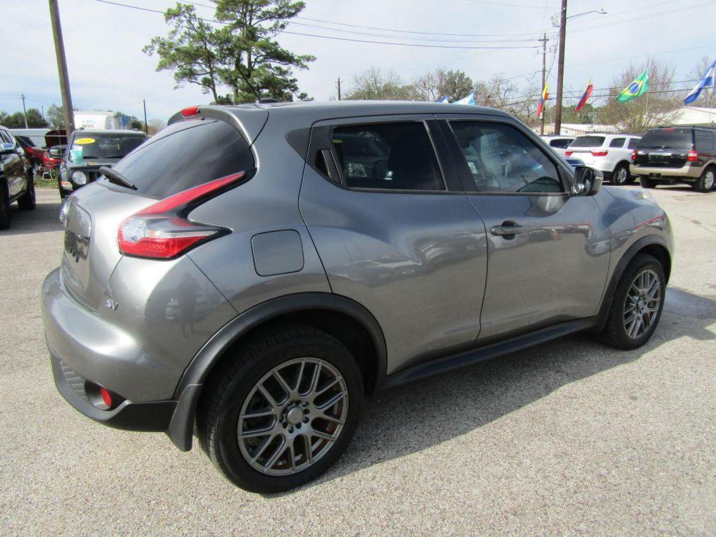 2015 GRAY NISSAN JUKE S (JN8AF5MR6FT) with an 1.6L engine, Continuously Variable transmission, located at 830 E. Canino Rd., Houston, TX, 77037, (281) 405-0440, 38.358219, -81.729942 - Photo#2