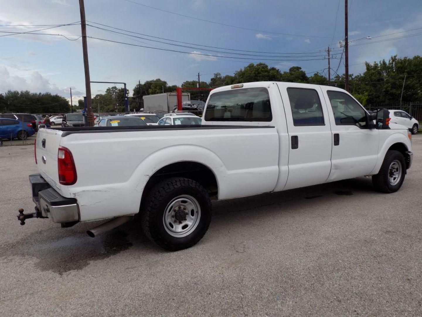 2012 WHITE FORD F250 SUPER DUTY (1FT7W2A69CE) with an 6.2L engine, Automatic transmission, located at 830 E. Canino Rd., Houston, TX, 77037, (281) 405-0440, 38.358219, -81.729942 - Photo#2