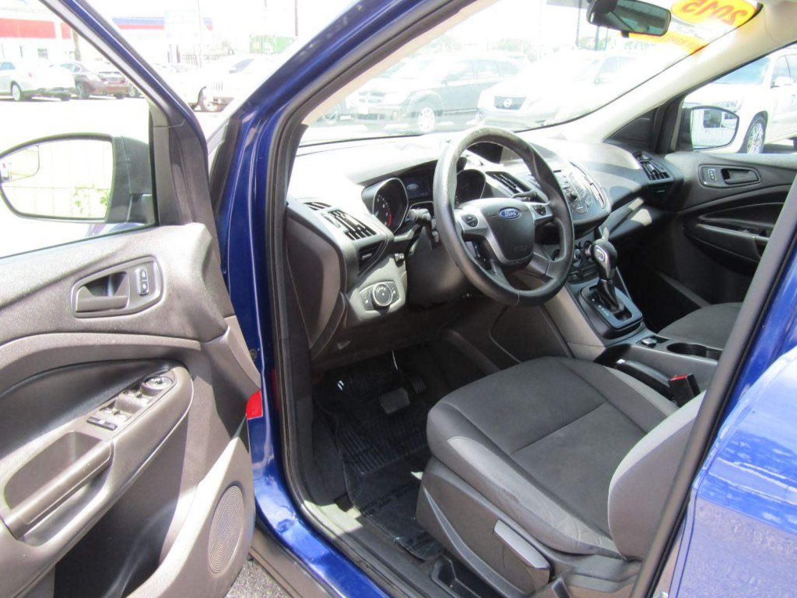 2015 BLUE FORD ESCAPE S (1FMCU0F71FU) with an 2.5L engine, Automatic transmission, located at 830 E. Canino Rd., Houston, TX, 77037, (281) 405-0440, 38.358219, -81.729942 - Photo #10