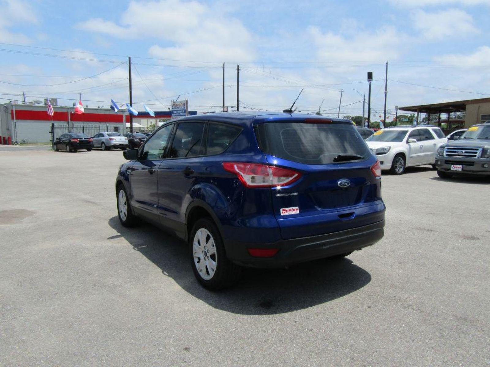 2015 BLUE FORD ESCAPE S (1FMCU0F71FU) with an 2.5L engine, Automatic transmission, located at 830 E. Canino Rd., Houston, TX, 77037, (281) 405-0440, 38.358219, -81.729942 - Photo #2