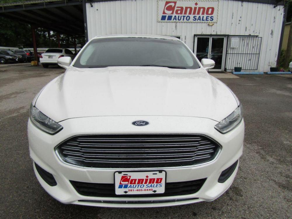 2016 WHITE FORD FUSION SE (3FA6P0H72GR) with an 2.5L engine, Automatic transmission, located at 830 E. Canino Rd., Houston, TX, 77037, (281) 405-0440, 38.358219, -81.729942 - $1,600 DOWN + TT and L IN HOUSE FINANCING AVAILABLE FINANCIAMIENTO EN CASA DISPONIBLE CALL OR COME IN TODAY 281 405 0440 CANINO AUTO SALES, LLC - Photo #0