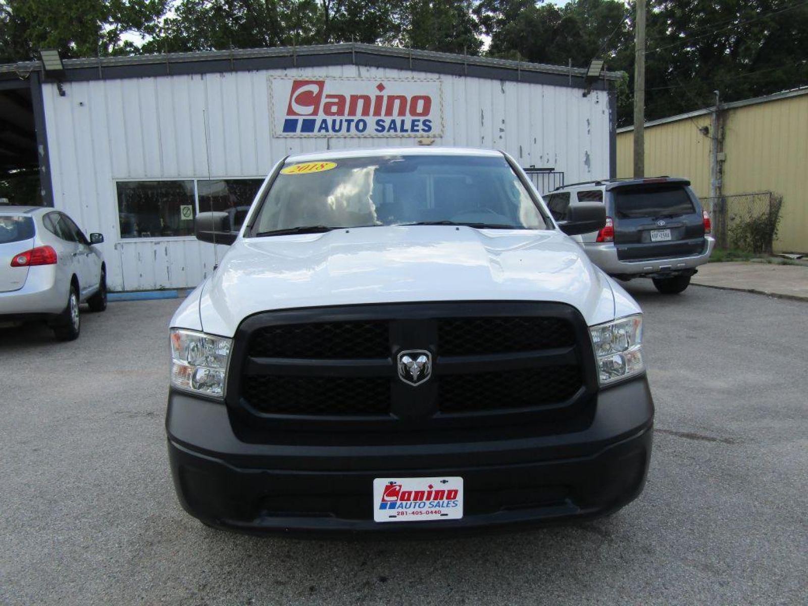 2018 WHITE RAM 1500 ST (1C6RR6FG7JS) with an 3.6L engine, Automatic transmission, located at 830 E. Canino Rd., Houston, TX, 77037, (281) 405-0440, 38.358219, -81.729942 - Photo #0