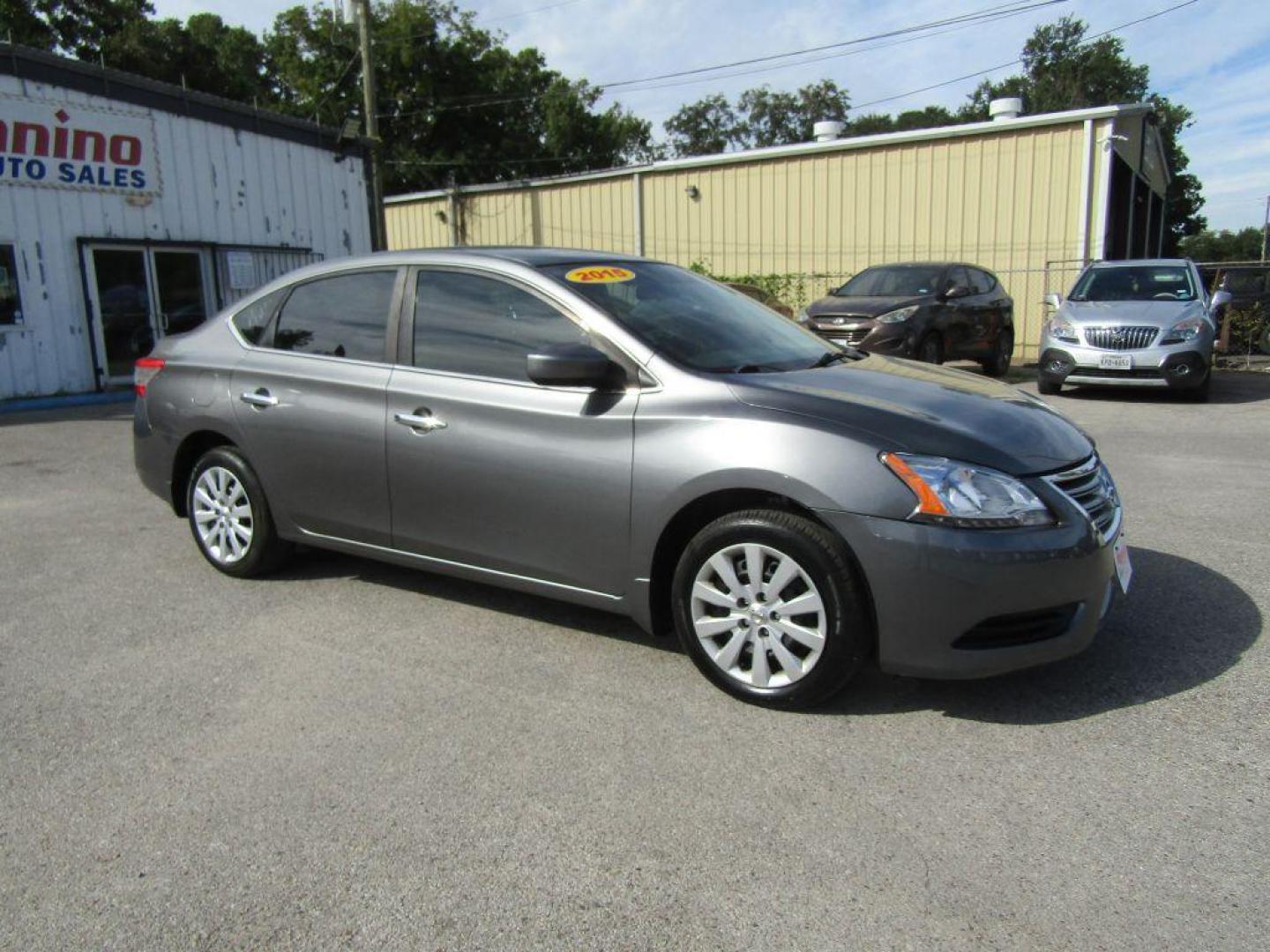 2015 GRAY NISSAN SENTRA S (3N1AB7AP5FY) with an 1.8L engine, Continuously Variable transmission, located at 830 E. Canino Rd., Houston, TX, 77037, (281) 405-0440, 38.358219, -81.729942 - Photo#1