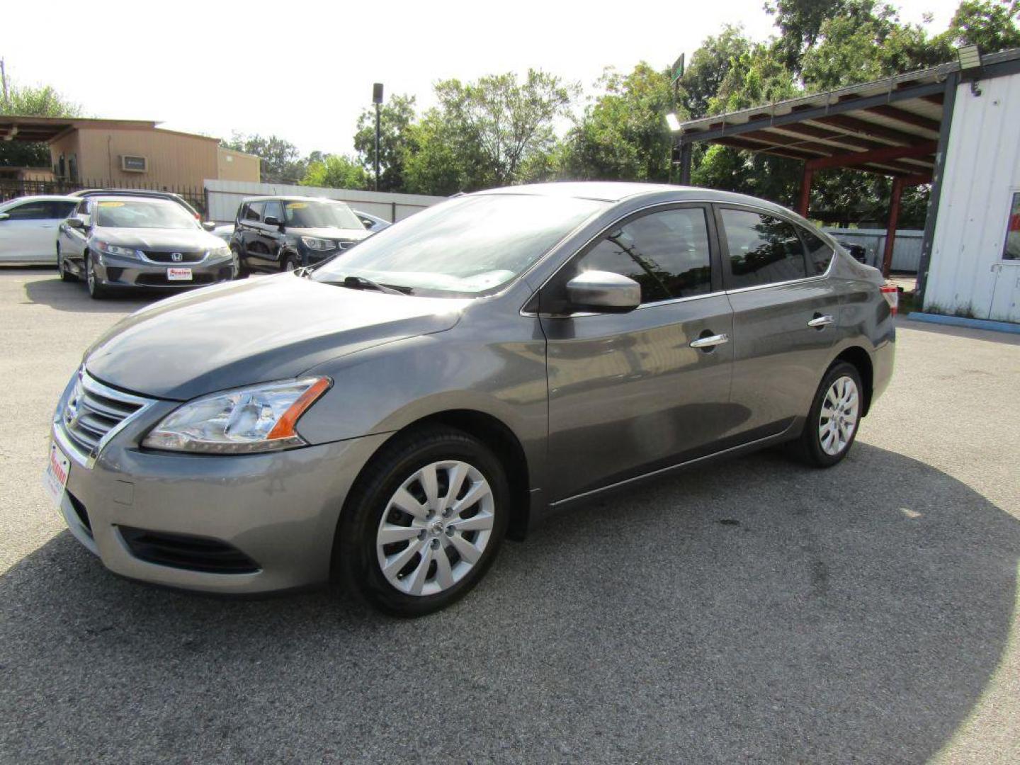 2015 GRAY NISSAN SENTRA S (3N1AB7AP5FY) with an 1.8L engine, Continuously Variable transmission, located at 830 E. Canino Rd., Houston, TX, 77037, (281) 405-0440, 38.358219, -81.729942 - Photo#5