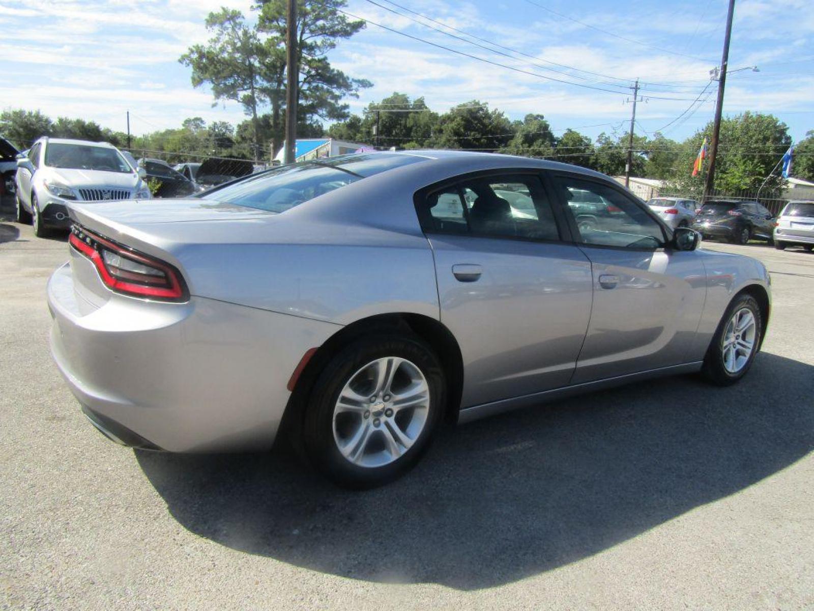 2015 SILVER DODGE CHARGER SE (2C3CDXBG3FH) with an 3.6L engine, Automatic transmission, located at 830 E. Canino Rd., Houston, TX, 77037, (281) 405-0440, 38.358219, -81.729942 - Photo #2