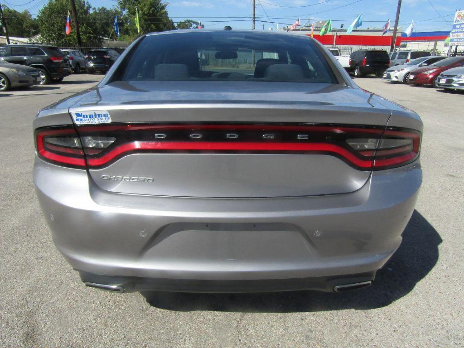 2015 SILVER DODGE CHARGER SE (2C3CDXBG3FH) with an 3.6L engine, Automatic transmission, located at 830 E. Canino Rd., Houston, TX, 77037, (281) 405-0440, 38.358219, -81.729942 - Photo #3