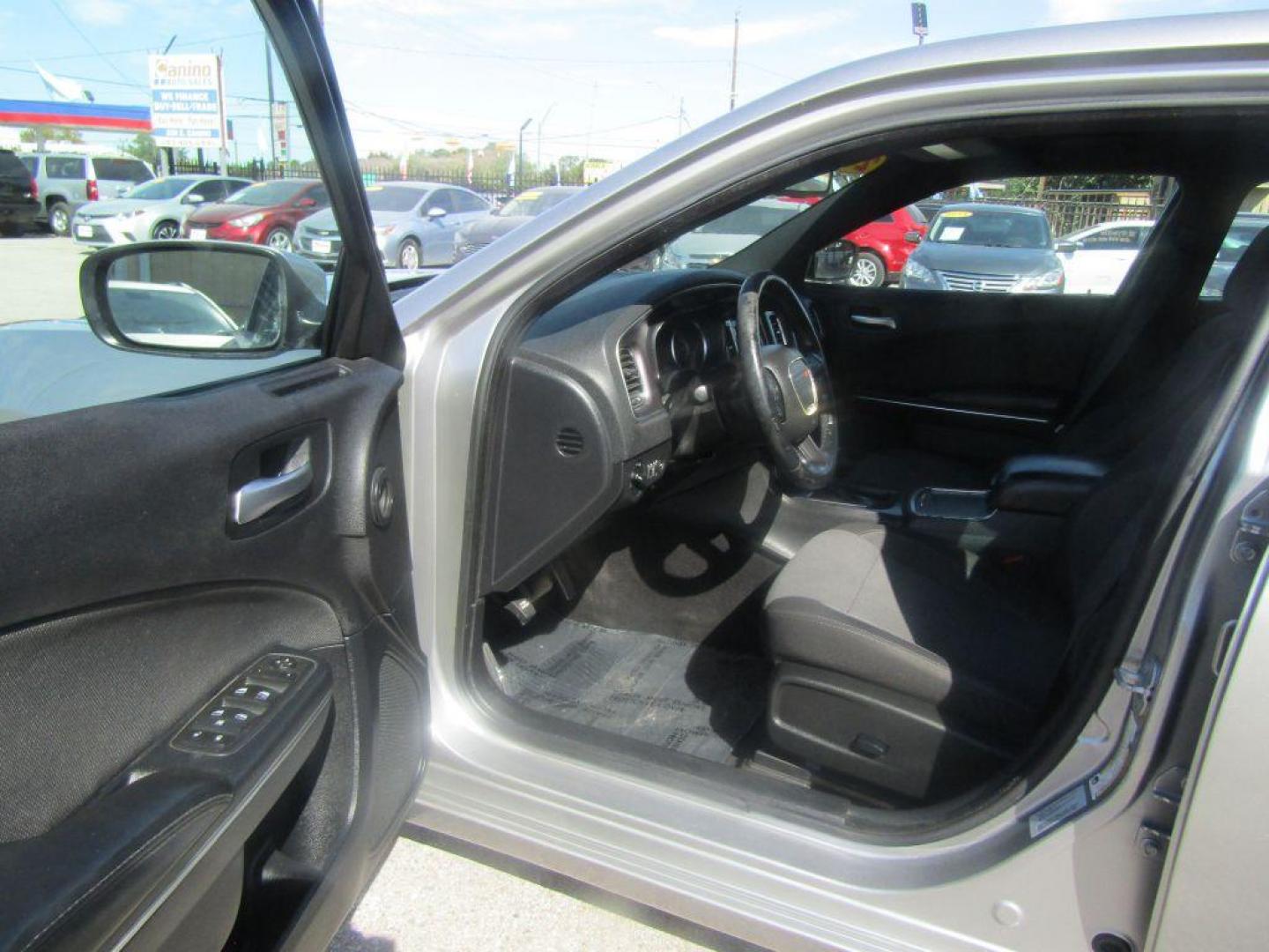 2015 SILVER DODGE CHARGER SE (2C3CDXBG3FH) with an 3.6L engine, Automatic transmission, located at 830 E. Canino Rd., Houston, TX, 77037, (281) 405-0440, 38.358219, -81.729942 - Photo#5