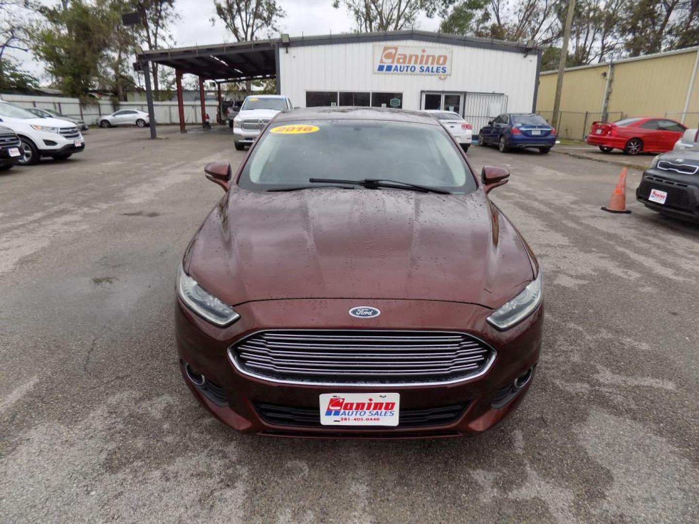2016 BROWN FORD FUSION SE (3FA6P0HD6GR) with an 1.5L engine, Automatic transmission, located at 830 E. Canino Rd., Houston, TX, 77037, (281) 405-0440, 38.358219, -81.729942 - Photo#0