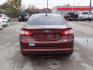 2016 BROWN FORD FUSION SE (3FA6P0HD6GR) with an 1.5L engine, Automatic transmission, located at 830 E. Canino Rd., Houston, TX, 77037, (281) 405-0440, 38.358219, -81.729942 - Photo#2