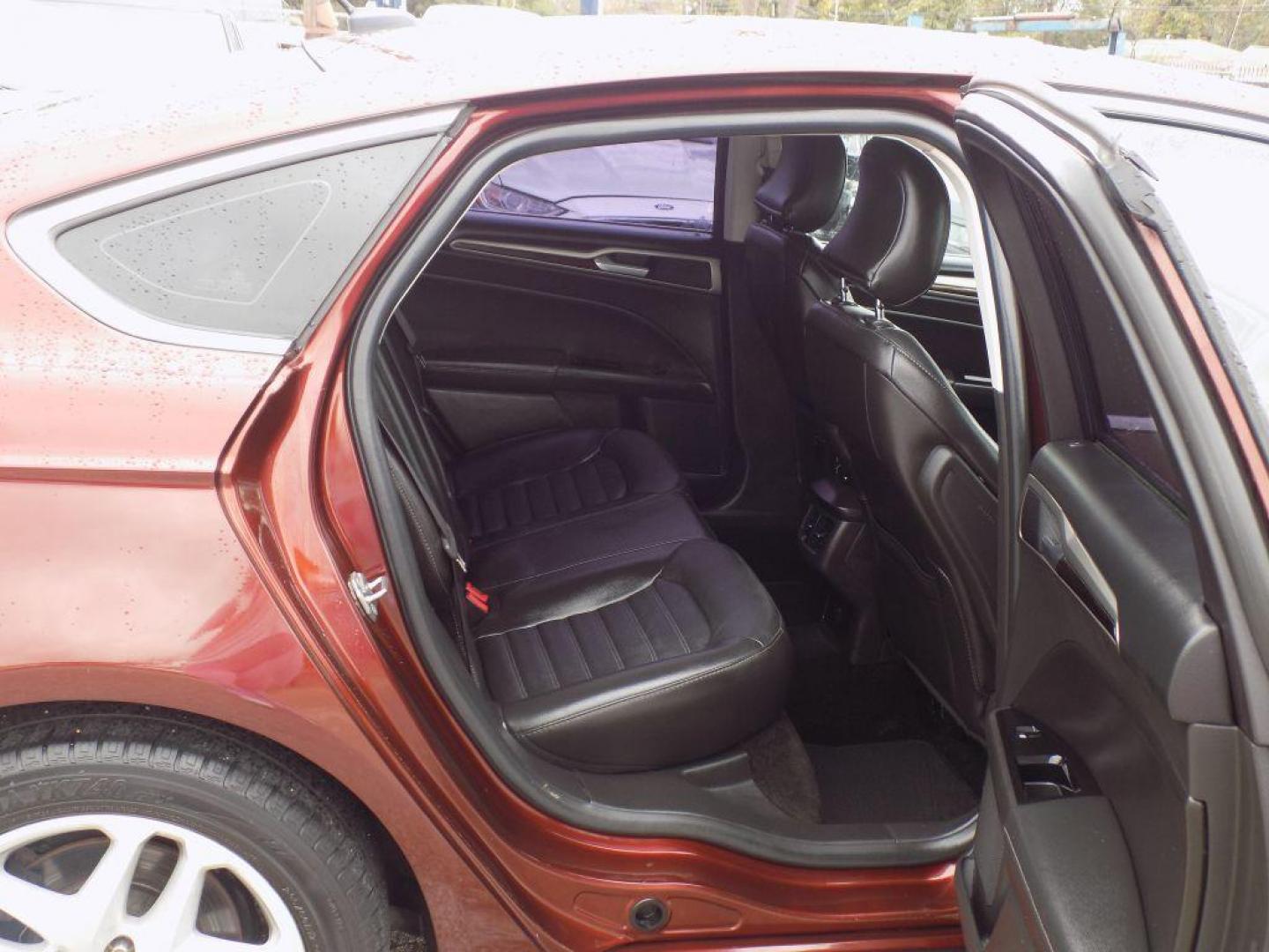 2016 BROWN FORD FUSION SE (3FA6P0HD6GR) with an 1.5L engine, Automatic transmission, located at 830 E. Canino Rd., Houston, TX, 77037, (281) 405-0440, 38.358219, -81.729942 - Photo#11