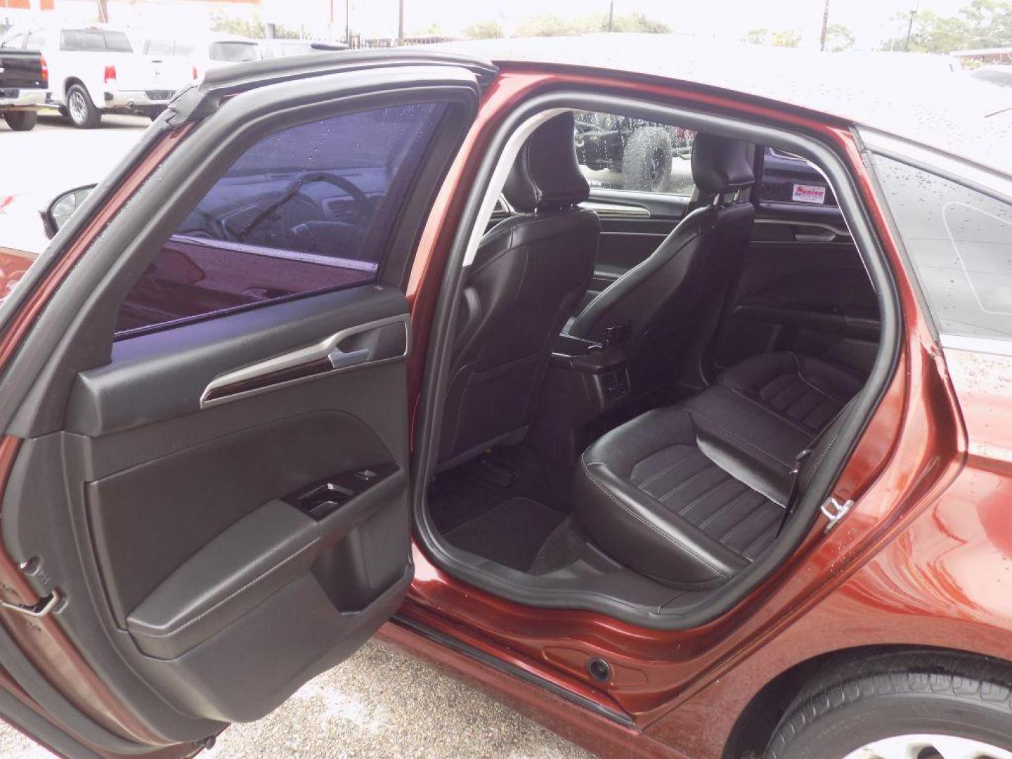 2016 BROWN FORD FUSION SE (3FA6P0HD6GR) with an 1.5L engine, Automatic transmission, located at 830 E. Canino Rd., Houston, TX, 77037, (281) 405-0440, 38.358219, -81.729942 - Photo#12