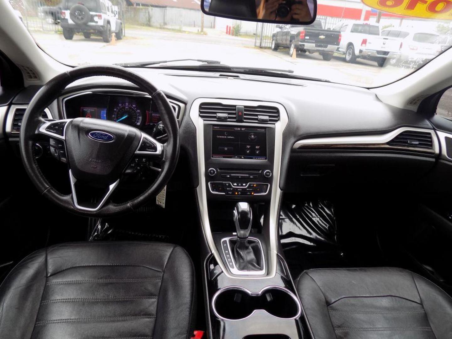 2016 BROWN FORD FUSION SE (3FA6P0HD6GR) with an 1.5L engine, Automatic transmission, located at 830 E. Canino Rd., Houston, TX, 77037, (281) 405-0440, 38.358219, -81.729942 - Photo#14