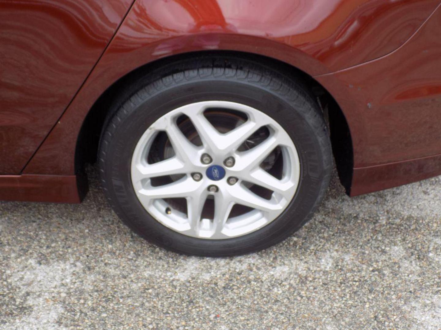 2016 BROWN FORD FUSION SE (3FA6P0HD6GR) with an 1.5L engine, Automatic transmission, located at 830 E. Canino Rd., Houston, TX, 77037, (281) 405-0440, 38.358219, -81.729942 - Photo#17