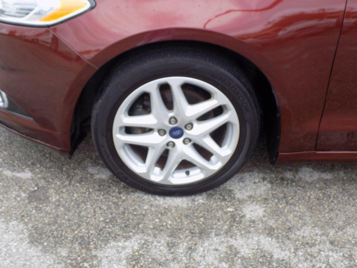 2016 BROWN FORD FUSION SE (3FA6P0HD6GR) with an 1.5L engine, Automatic transmission, located at 830 E. Canino Rd., Houston, TX, 77037, (281) 405-0440, 38.358219, -81.729942 - Photo#18
