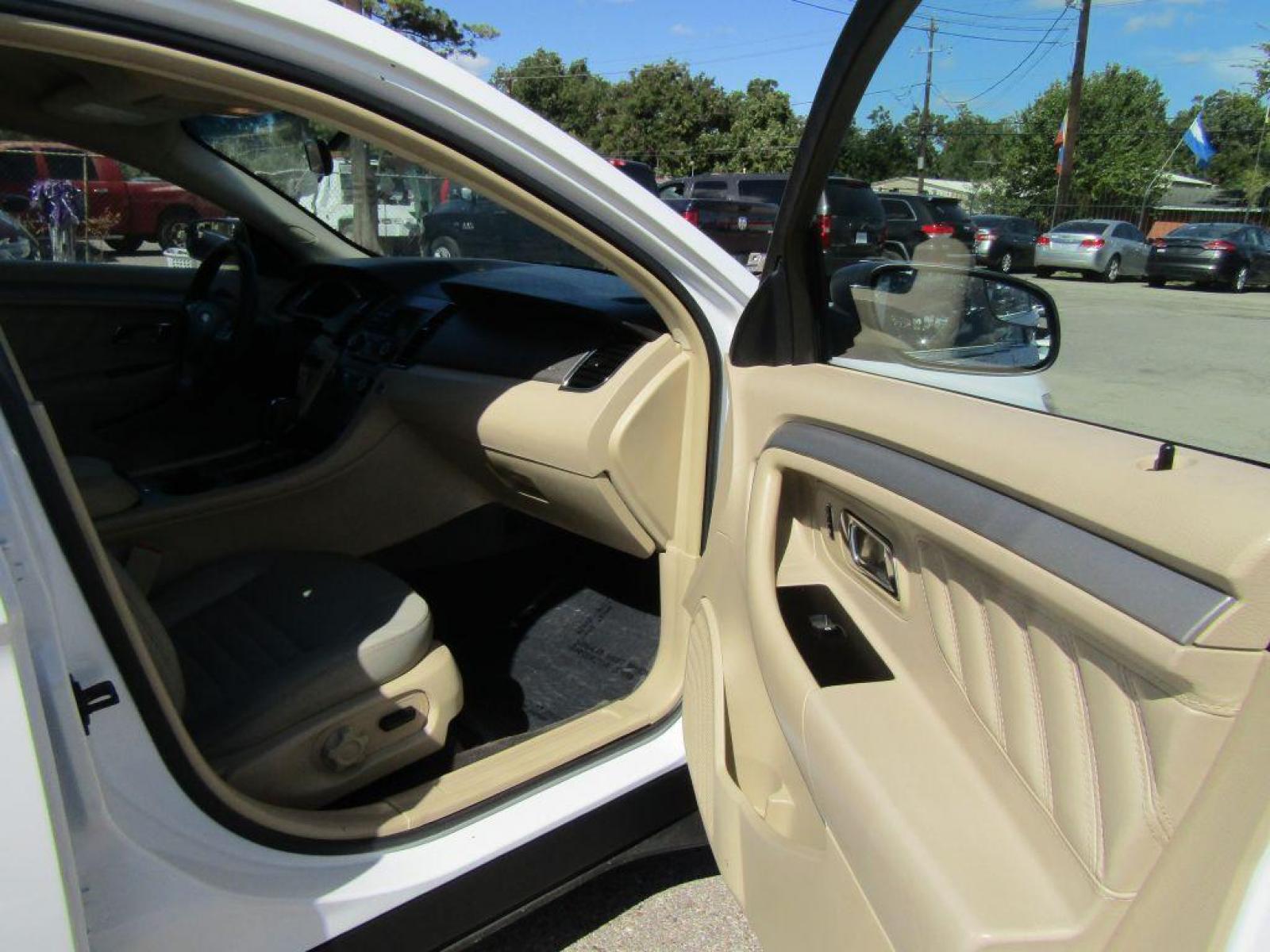 2015 WHITE FORD TAURUS SE (1FAHP2D89FG) with an 3.5L engine, Automatic transmission, located at 830 E. Canino Rd., Houston, TX, 77037, (281) 405-0440, 38.358219, -81.729942 - Photo #9