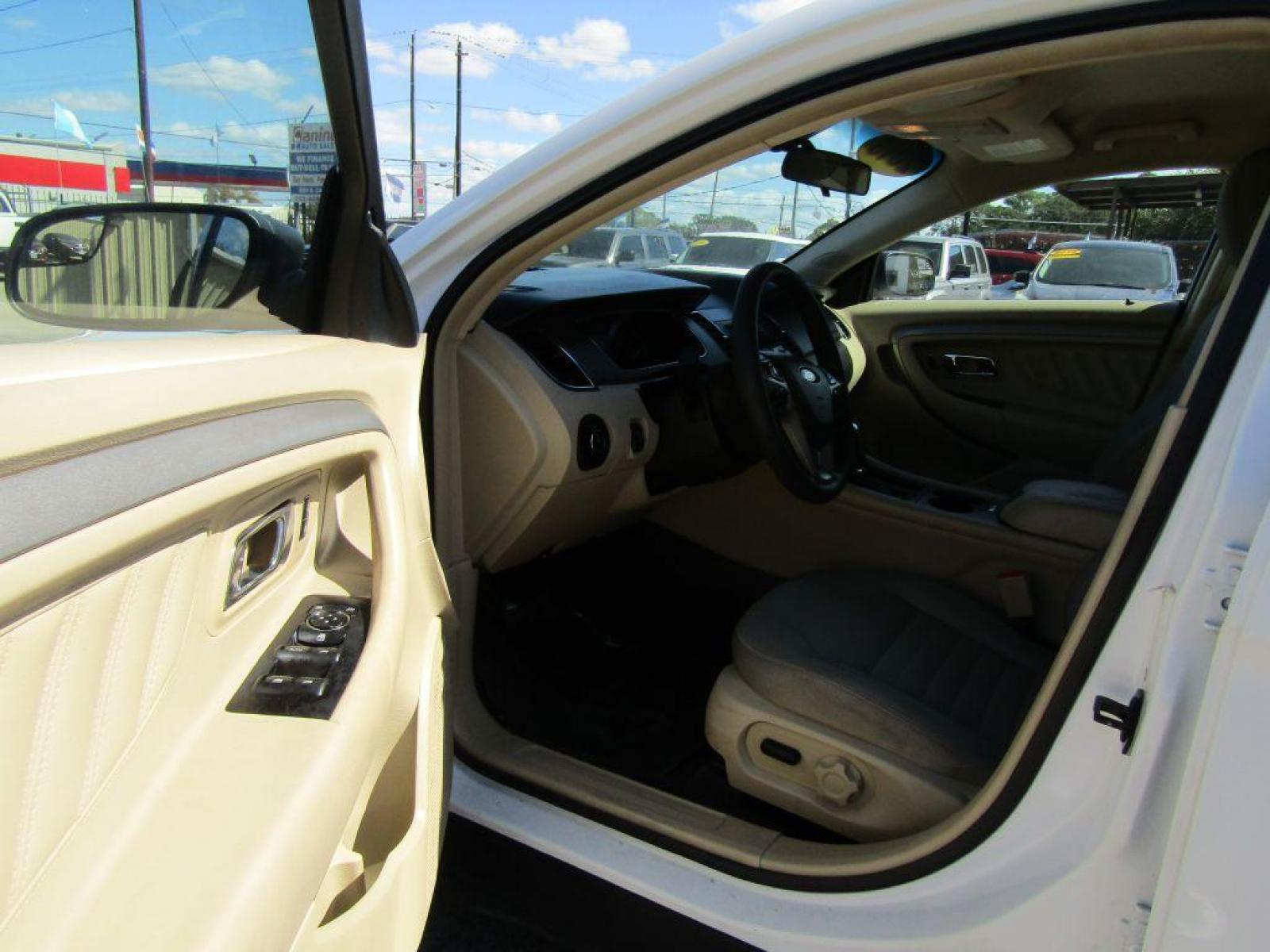 2015 WHITE FORD TAURUS SE (1FAHP2D89FG) with an 3.5L engine, Automatic transmission, located at 830 E. Canino Rd., Houston, TX, 77037, (281) 405-0440, 38.358219, -81.729942 - Photo #4