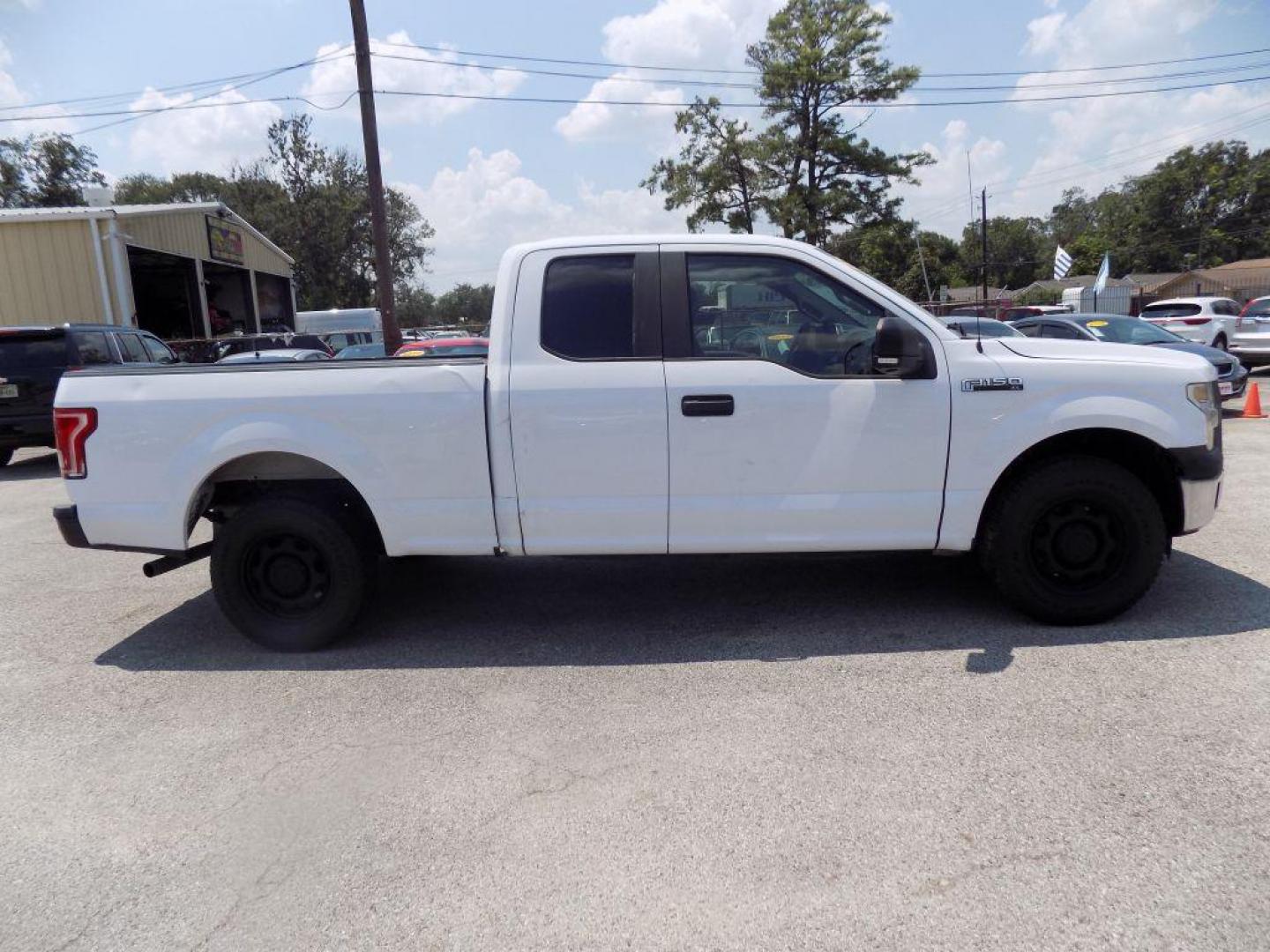 2015 WHITE FORD F150 SUPER CAB (1FTEX1CF8FK) with an 5.0L engine, Automatic transmission, located at 830 E. Canino Rd., Houston, TX, 77037, (281) 405-0440, 38.358219, -81.729942 - Photo#1