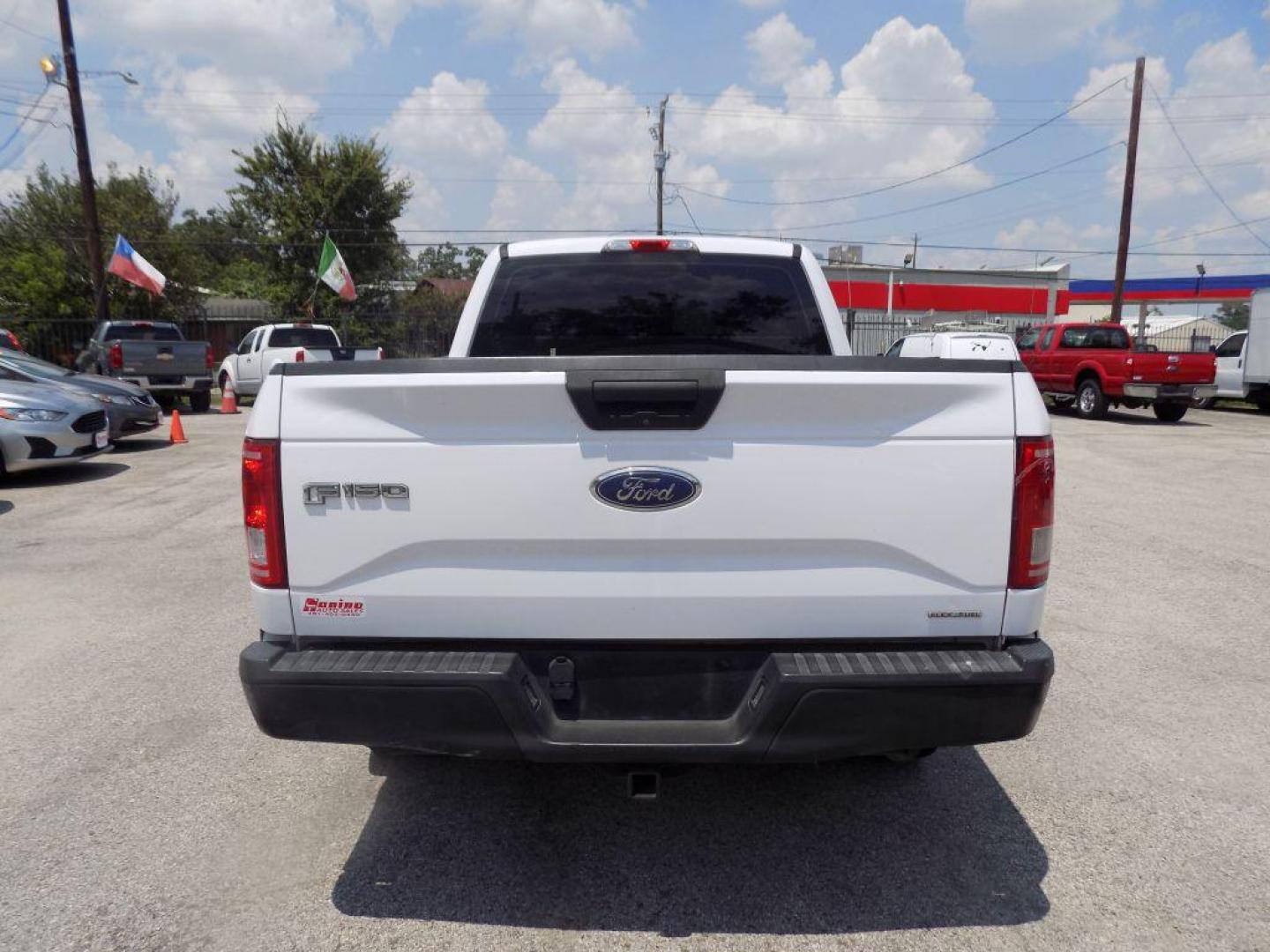 2015 WHITE FORD F150 SUPER CAB (1FTEX1CF8FK) with an 5.0L engine, Automatic transmission, located at 830 E. Canino Rd., Houston, TX, 77037, (281) 405-0440, 38.358219, -81.729942 - Photo#2