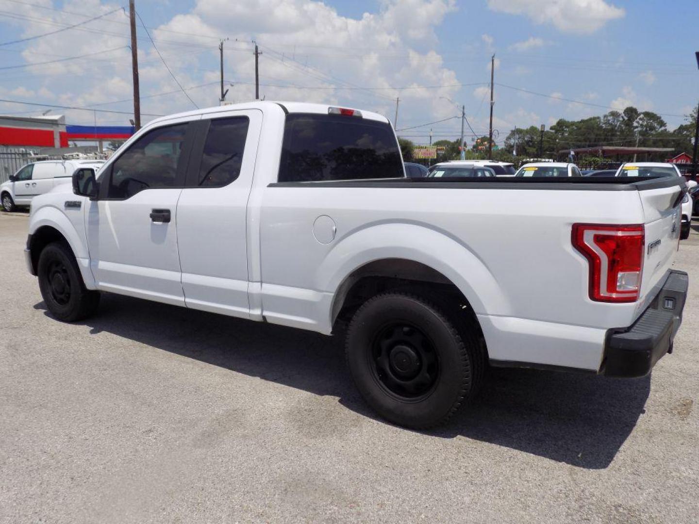 2015 WHITE FORD F150 SUPER CAB (1FTEX1CF8FK) with an 5.0L engine, Automatic transmission, located at 830 E. Canino Rd., Houston, TX, 77037, (281) 405-0440, 38.358219, -81.729942 - Photo#4