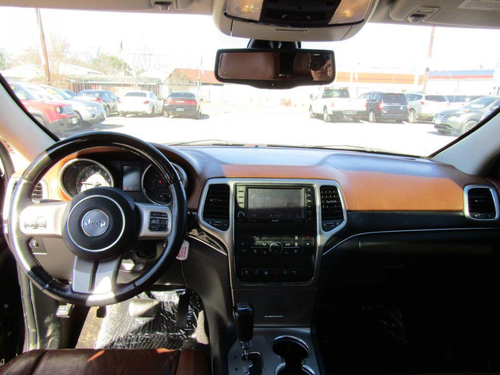 2012 BROWN JEEP GRAND CHEROKEE OVERLAND (1C4RJFCT7CC) with an 5.7L engine, Automatic transmission, located at 830 E. Canino Rd., Houston, TX, 77037, (281) 405-0440, 38.358219, -81.729942 - Photo #18