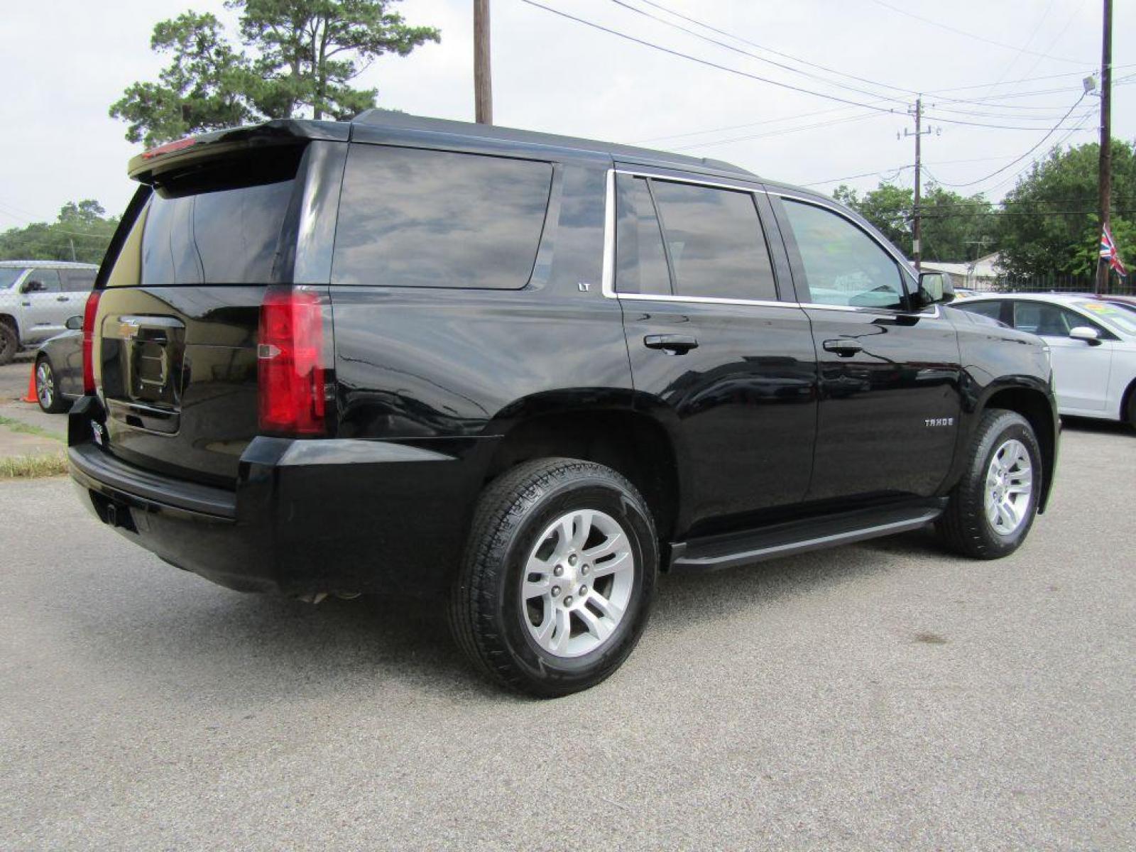 2019 BLACK CHEVROLET TAHOE 1500 LT (1GNSCBKC9KR) with an 5.3L engine, Automatic transmission, located at 830 E. Canino Rd., Houston, TX, 77037, (281) 405-0440, 38.358219, -81.729942 - Photo #4
