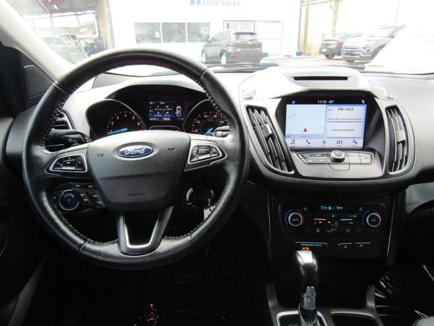 2018 BLACK FORD ESCAPE SE (1FMCU9GD2JU) with an 1.5L engine, Automatic transmission, located at 830 E. Canino Rd., Houston, TX, 77037, (281) 405-0440, 38.358219, -81.729942 - Photo#16