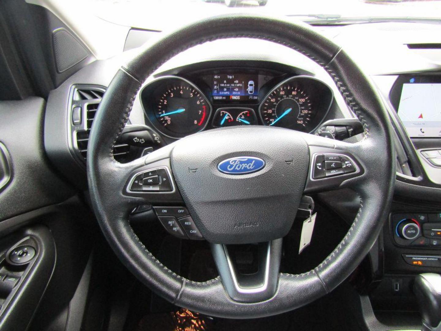 2018 BLACK FORD ESCAPE SE (1FMCU9GD2JU) with an 1.5L engine, Automatic transmission, located at 830 E. Canino Rd., Houston, TX, 77037, (281) 405-0440, 38.358219, -81.729942 - Photo#18