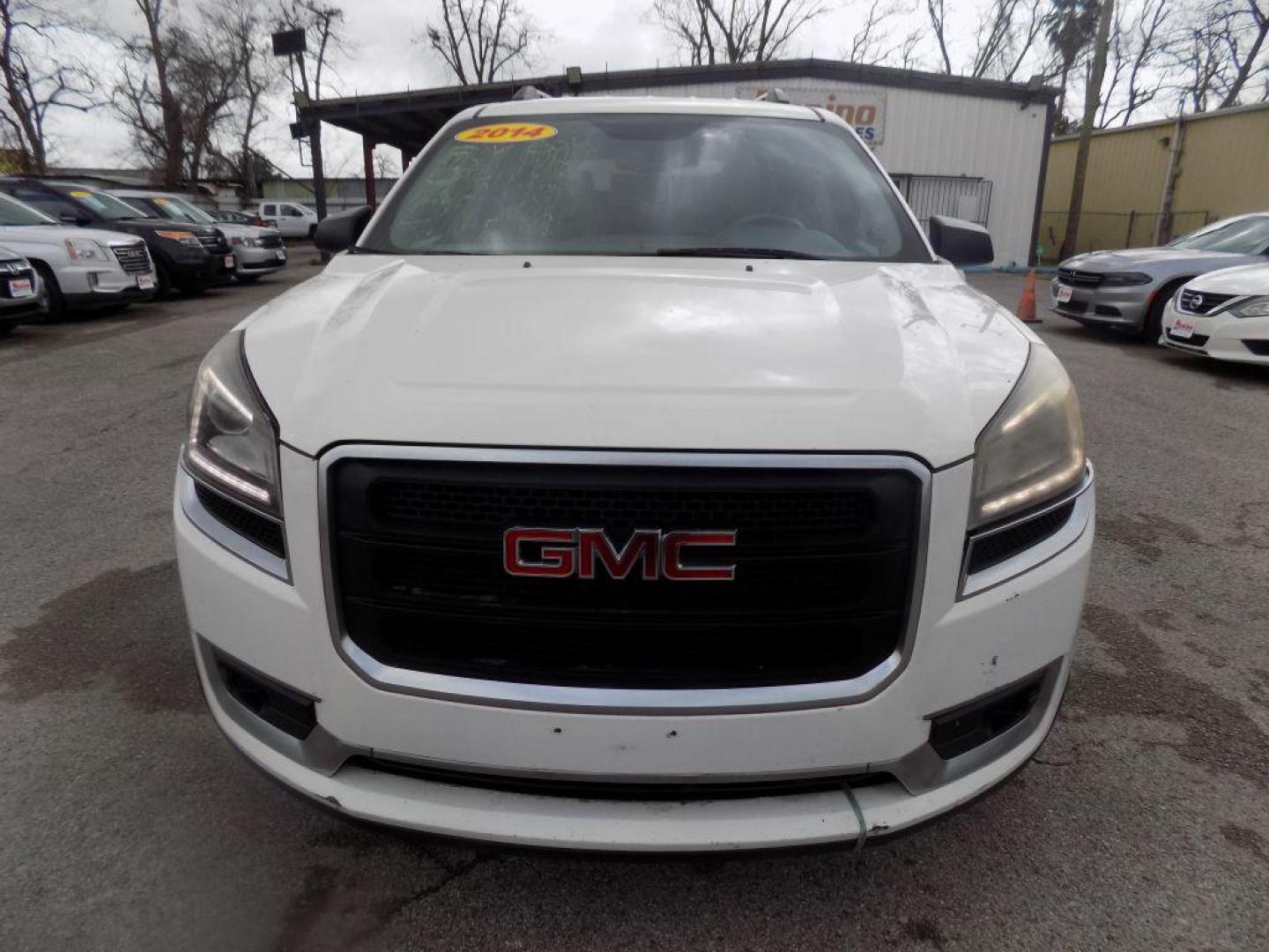 2014 WHITE GMC ACADIA SLE (1GKKRNED1EJ) with an 3.6L engine, Automatic transmission, located at 830 E. Canino Rd., Houston, TX, 77037, (281) 405-0440, 38.358219, -81.729942 - $3900 Cash +TT and L - Photo#0