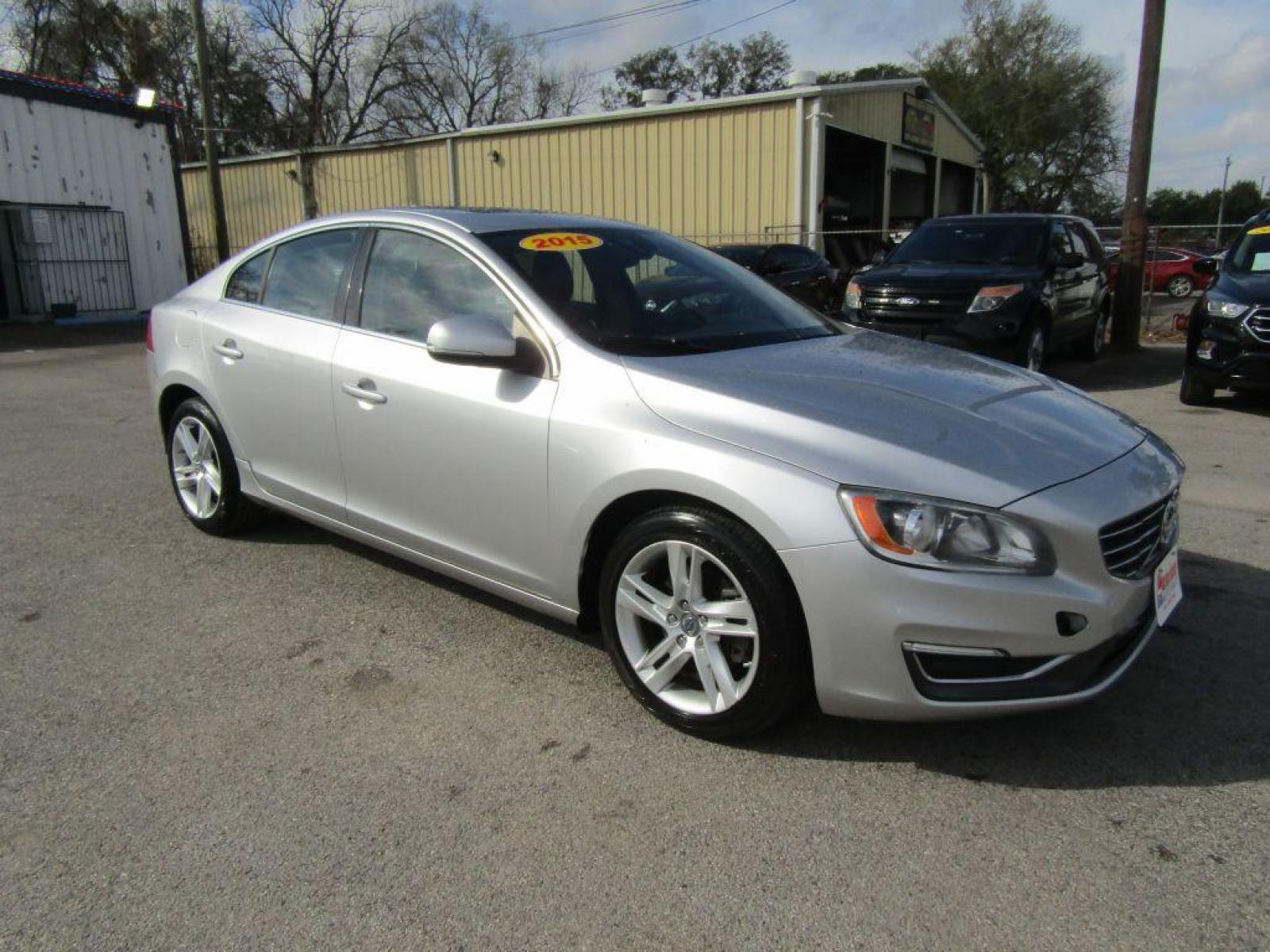 2015 SILVER VOLVO S60 PREMIER (YV126MFK3F1) with an 2.0L engine, Automatic transmission, located at 830 E. Canino Rd., Houston, TX, 77037, (281) 405-0440, 38.358219, -81.729942 - Photo #1