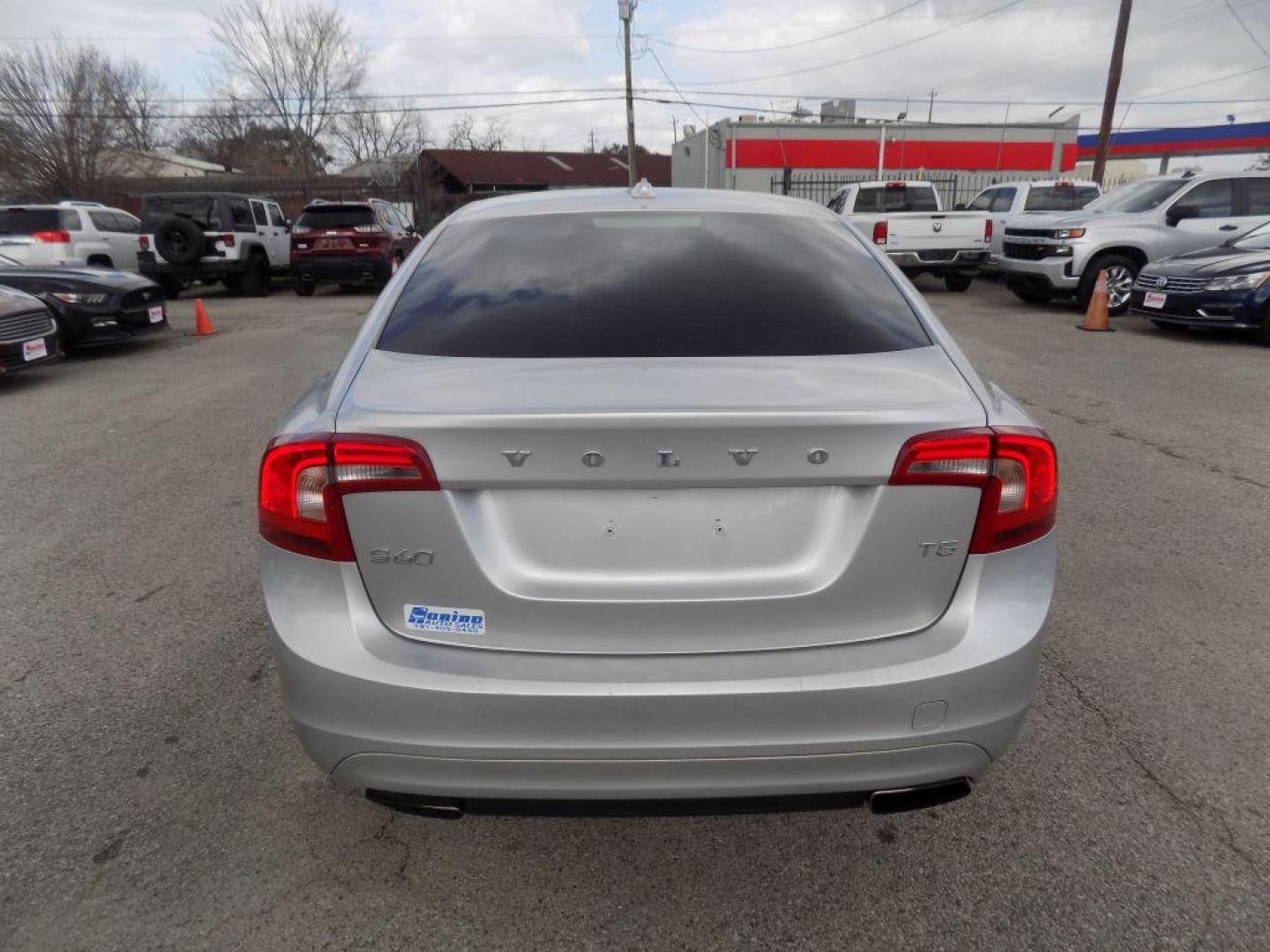 2015 SILVER VOLVO S60 PREMIER (YV126MFK3F1) with an 2.0L engine, Automatic transmission, located at 830 E. Canino Rd., Houston, TX, 77037, (281) 405-0440, 38.358219, -81.729942 - Photo#2