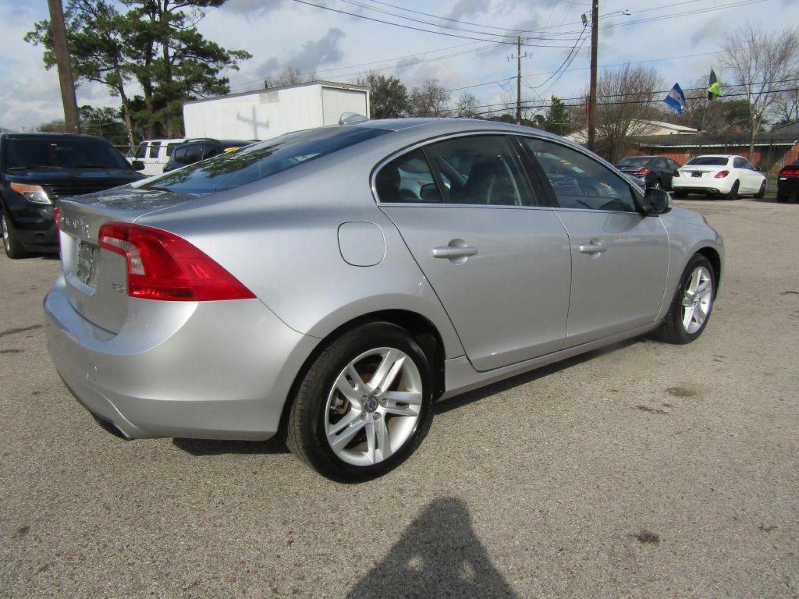 2015 SILVER VOLVO S60 PREMIER (YV126MFK3F1) with an 2.0L engine, Automatic transmission, located at 830 E. Canino Rd., Houston, TX, 77037, (281) 405-0440, 38.358219, -81.729942 - Photo #2