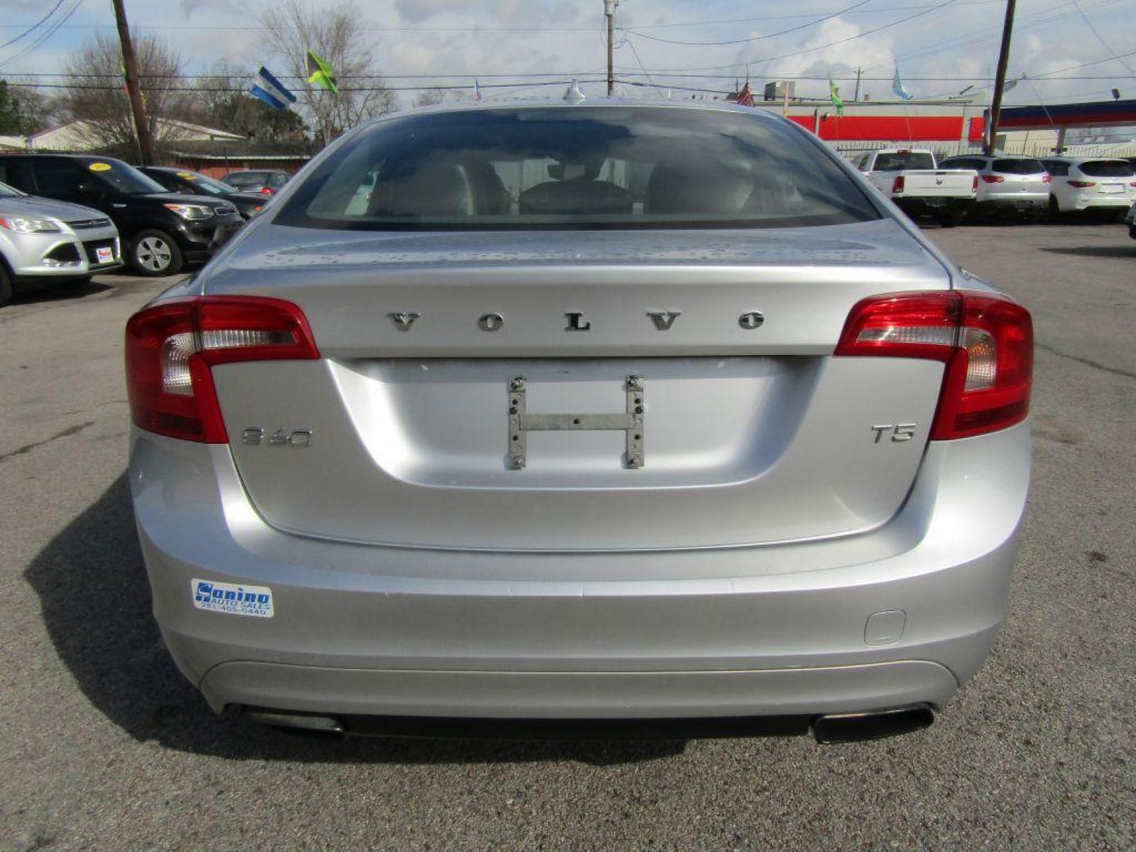 2015 SILVER VOLVO S60 PREMIER (YV126MFK3F1) with an 2.0L engine, Automatic transmission, located at 830 E. Canino Rd., Houston, TX, 77037, (281) 405-0440, 38.358219, -81.729942 - Photo #3